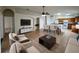 Comfortable living room with a dining area and modern appliances in the background at 25729 Aldus Dr, Land O Lakes, FL 34639