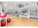 Bright fitness studio with mirrors, ballet barres, TVs, and fitness equipment at 2724 Coco Palm Cir, Wesley Chapel, FL 33543