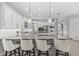 Spacious kitchen with an island, breakfast bar and stainless steel appliances at 2724 Coco Palm Cir, Wesley Chapel, FL 33543