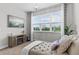 Relaxing sitting room featuring a chaise lounge, stylish lighting, and a serene view at 2724 Coco Palm Cir, Wesley Chapel, FL 33543