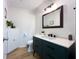 Chic bathroom with contemporary vanity, elegant mirror, and modern fixtures at 3005 Wilton Ln, Valrico, FL 33596