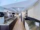 Open-concept kitchen featuring granite countertops, stainless steel appliances, and seamless flow to the living space at 3005 Wilton Ln, Valrico, FL 33596