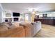 Spacious living room featuring hardwood floors, fireplace, and modern design at 3005 Wilton Ln, Valrico, FL 33596