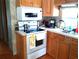 A well-equipped kitchen with modern appliances and ample counter space at 35152 Dodie, Zephyrhills, FL 33541