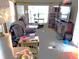 Cozy living room area featuring comfortable seating and abundant natural light at 35152 Dodie, Zephyrhills, FL 33541