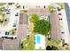 Aerial view of apartments featuring a refreshing community pool and ample parking spaces at 3802 Cortez Cir # D, Tampa, FL 33614