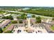 Scenic aerial view of an apartment community with mature trees and convenient highway access at 3802 Cortez Cir # D, Tampa, FL 33614