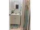 Bathroom with white vanity and floral shower curtain at 3802 Cortez Cir # D, Tampa, FL 33614