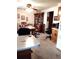 Spacious dining area featuring a table set for six, with a large china cabinet at 39343/39349 Rusbe, Zephyrhills, FL 33540