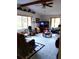 Bright living room with vaulted ceiling, large windows, and comfortable seating at 39343/39349 Rusbe, Zephyrhills, FL 33540