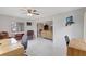 Open living room seamlessly connects to a dining area and offers lots of natural light at 4512 Superior Ln, Clearwater, FL 33762