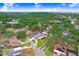 An aerial view shows a single-Gathering home in a neighborhood, close to the bay at 4640 W Lamb Ave, Tampa, FL 33629