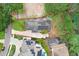 An overhead shot of a home with solar panels with a well-maintained landscape at 4640 W Lamb Ave, Tampa, FL 33629