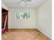 This bedroom features parquet floors, natural light, and is partially under construction at 4640 W Lamb Ave, Tampa, FL 33629