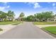 Scenic street view featuring well-maintained homes, lush landscaping, and inviting curb appeal at 4640 W Lamb Ave, Tampa, FL 33629