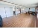 Open floor plan featuring hardwood flooring that connects the living room to the kitchen at 4722 Harris Ave, Sarasota, FL 34233