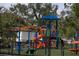 Community playground with slides, swings, and climbing structures for children at 4722 Harris Ave, Sarasota, FL 34233