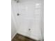 A pristine white shower stall offers a clean and bright showering experience at 4722 Harris Ave, Sarasota, FL 34233