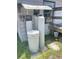Water filtration system with tanks and equipment installed outside near the home at 4722 Harris Ave, Sarasota, FL 34233