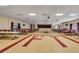 Spacious community hall with tables and chairs, ideal for events, gatherings, and socializing at 5501 80Th N St # 206, St Petersburg, FL 33709