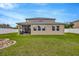 Spacious backyard with a screened patio at 5624 Fisher Glen Loop, Wesley Chapel, FL 33545