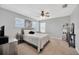 Bedroom featuring natural light from the windows and carpet flooring at 5624 Fisher Glen Loop, Wesley Chapel, FL 33545