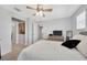 Bedroom featuring neutral colors and carpet with a view to the hallway at 5624 Fisher Glen Loop, Wesley Chapel, FL 33545