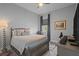 Comfortable bedroom with gray walls, recessed lighting, with ceiling fan and view of work area at 5742 Stockport St, Riverview, FL 33578