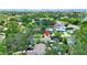 Charming home nestled amidst lush greenery, featuring a private pool and serene outdoor living spaces at 6011 Tangerine S Ave, Gulfport, FL 33707