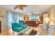 Spacious main bedroom featuring a ceiling fan and natural light at 6011 Tangerine S Ave, Gulfport, FL 33707