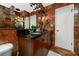 Modern bathroom with double sinks, updated fixtures and a tiled design at 614 12Th Nw St, Largo, FL 33770
