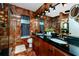 Updated bathroom features double sinks, modern fixtures, and a glass-enclosed shower at 614 12Th Nw St, Largo, FL 33770