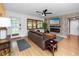 Inviting living room featuring a modern fireplace and comfortable seating at 614 12Th Nw St, Largo, FL 33770