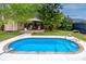 Refreshing backyard pool with patio area and charming gazebo offers a serene outdoor retreat at 614 12Th Nw St, Largo, FL 33770