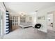 Spacious bedroom with carpet, ceiling fan, and closet at 6913 Grande Vista S Way, St Petersburg, FL 33707