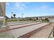 Community shuffleboard courts with covered seating, providing an opportunity for friendly competition at 7118 El Meyers St, Zephyrhills, FL 33541