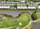 Scenic aerial view of the golf course and surrounding residential area at 7304 W Country Club N Dr # 113, Sarasota, FL 34243