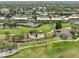 Picturesque aerial view highlighting the community's golf course and waterways at 7304 W Country Club N Dr # 113, Sarasota, FL 34243
