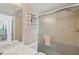Bathroom featuring toilet, updated shower, wicker shelves, and vanity at 7304 W Country Club N Dr # 113, Sarasota, FL 34243