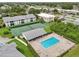 Aerial view of the community pool and surrounding amenities at 7304 W Country Club N Dr # 113, Sarasota, FL 34243