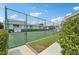 Community tennis courts for residents' enjoyment and recreation at 7304 W Country Club N Dr # 113, Sarasota, FL 34243