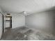 Bedroom features a ceiling fan, a large window overlooking the city, and a laundry closet at 7600 Sun Island S Dr # 603, South Pasadena, FL 33707