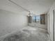 Spacious bedroom with a ceiling fan and a large window overlooking the city at 7600 Sun Island S Dr # 603, South Pasadena, FL 33707