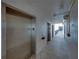 Hallway leading to elevators and other building access points at 7600 Sun Island S Dr # 603, South Pasadena, FL 33707
