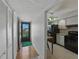 Residence foyer leading into kitchen and common areas at 7600 Sun Island S Dr # 603, South Pasadena, FL 33707