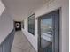 Exterior hallway and building access door to residence at 7600 Sun Island S Dr # 603, South Pasadena, FL 33707