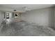 Spacious living room with lighting and balcony door at 7600 Sun Island S Dr # 603, South Pasadena, FL 33707