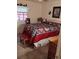 Cozy bedroom with a comfortable bed and a quaint decorative quilt at 7608 Chenkin, Zephyrhills, FL 33540