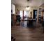 Dining Room with luxury vinyl flooring, a ceiling fan, and access to the kitchen and living room at 7608 Chenkin, Zephyrhills, FL 33540