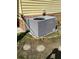Exterior view of the home's air conditioning unit at 7608 Chenkin, Zephyrhills, FL 33540